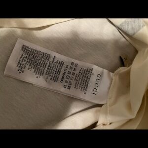 Men’s Gucci shirt only worn once I have taken to the cleaners to get clean.